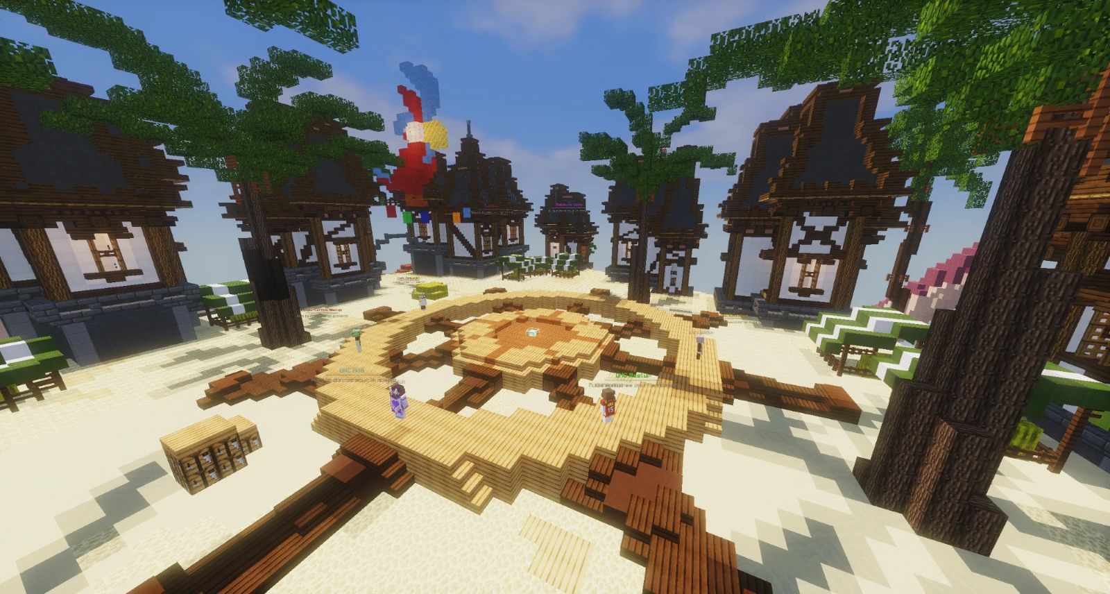 Le hub UHC : place en bois entourée de maisons à colombages et de palmiers